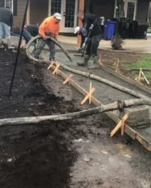 Driveway concrete pour in progress
